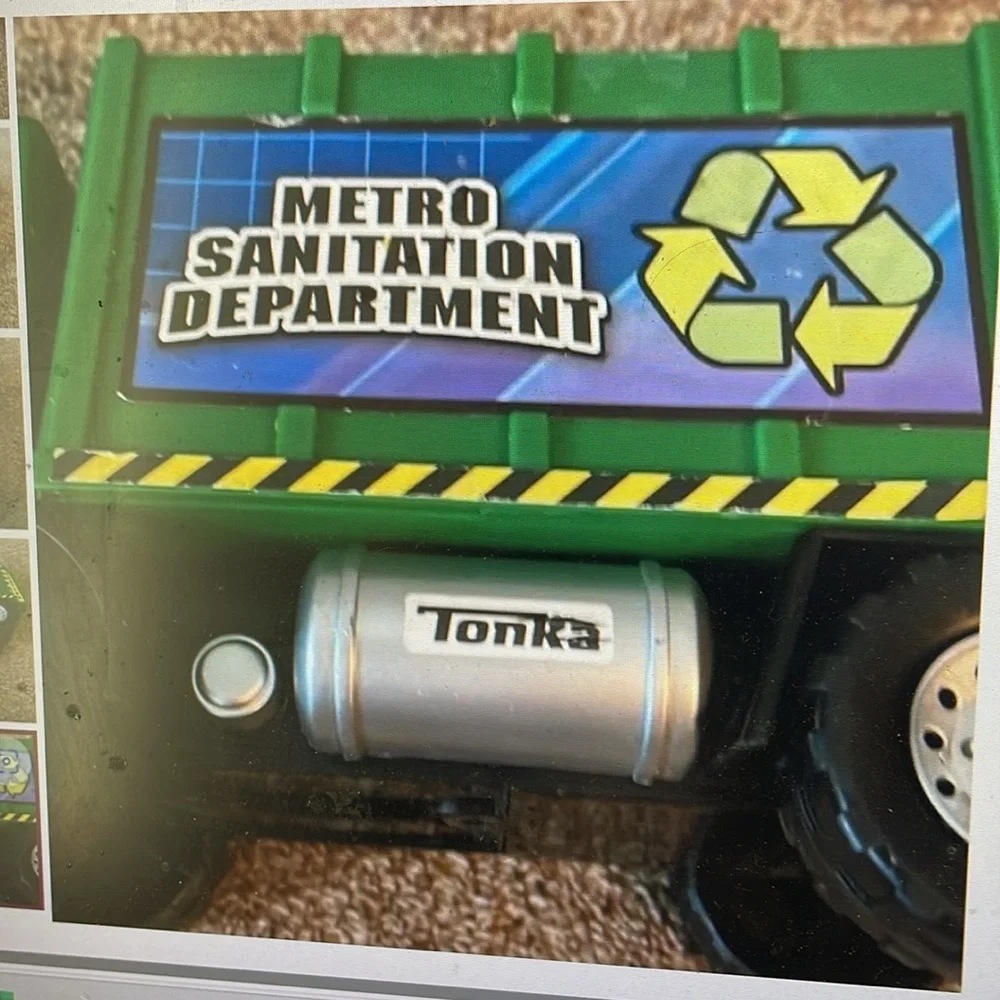 Tonka metro sanitation department green trash truck